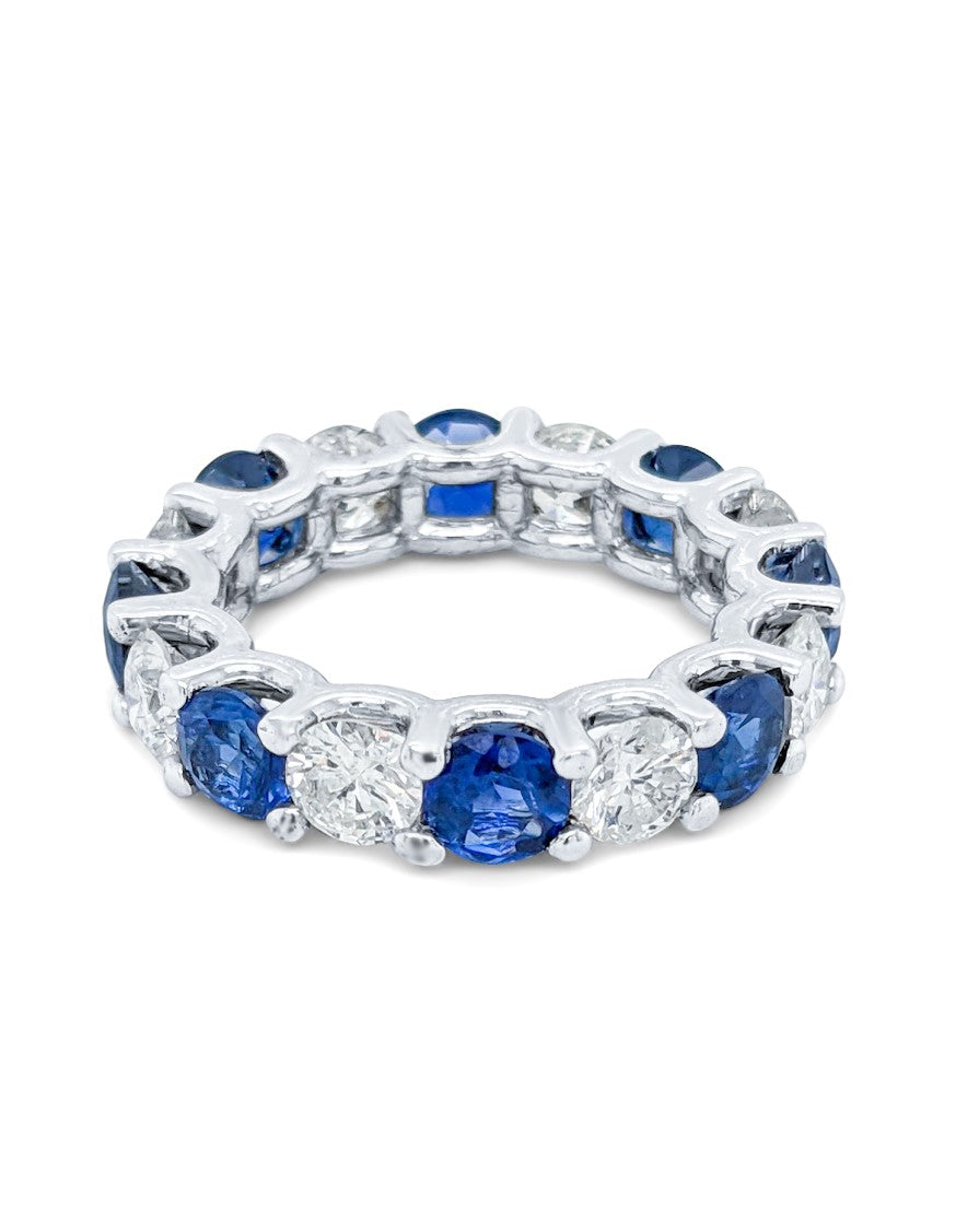 Diamond Platinum Eternity Band with Blue Sapphire V0349